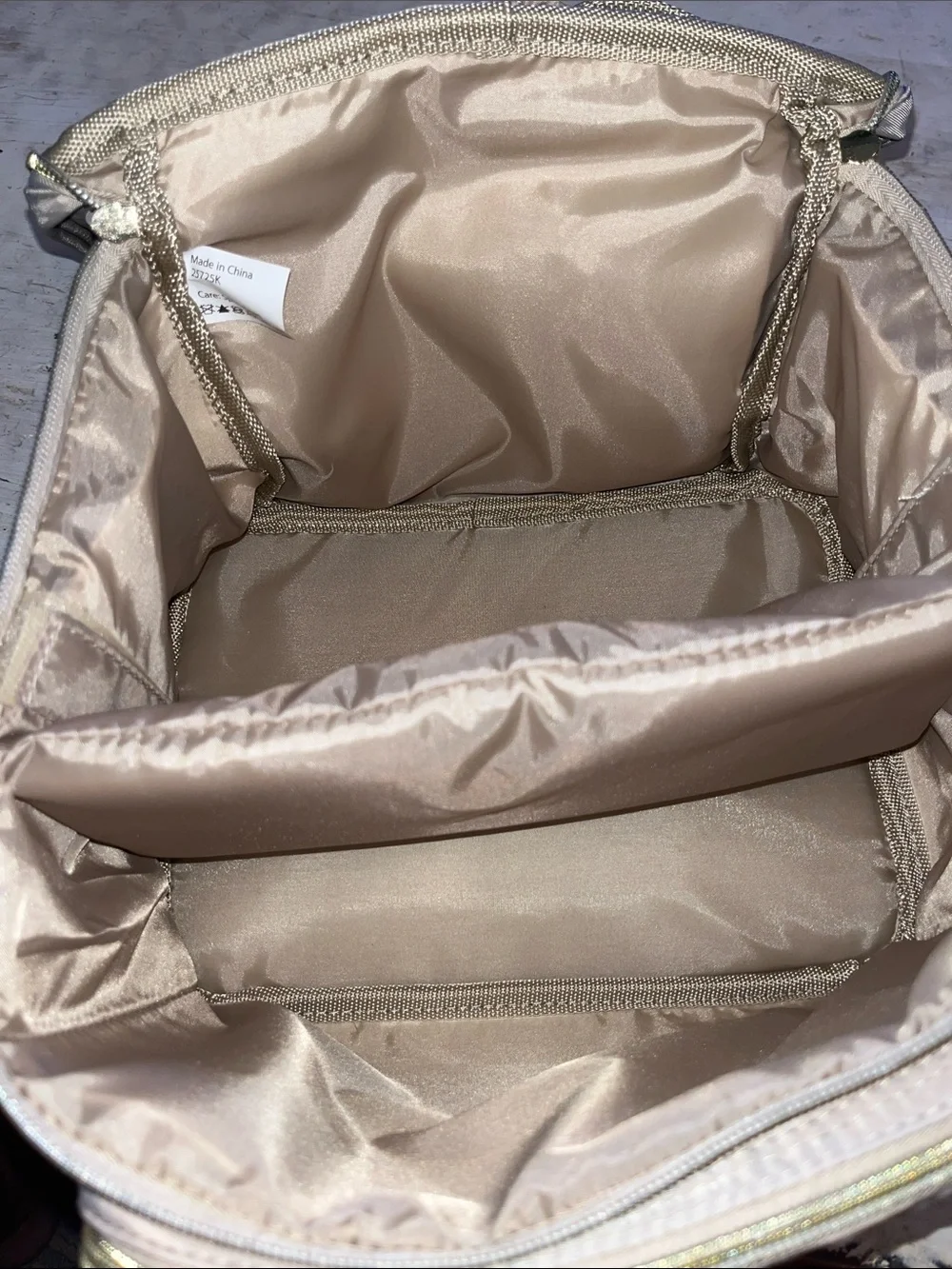 Paris Hilton quilted taupe travel cosmetic case